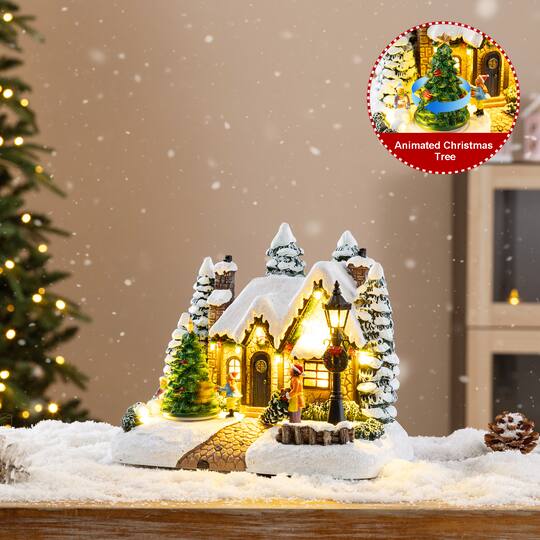 Glitzhome® 9.5" Lighted Christmas Snowy Musical Resin Village with Movement and Timer